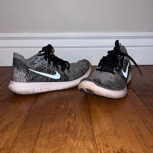 Women’s Nike Free Run Flyknit; size 7; used; smoke free home.